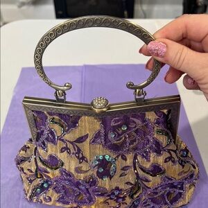 Elegant Purple and Gold Embroidered Handbag with Brass Hardware